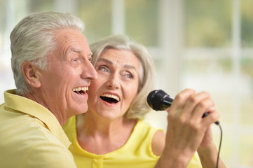 couple husband and wife singing songs