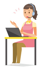 Female home helper wearing an apron is talking with headset