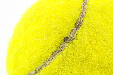 Macro of yellow tennis ball isolated