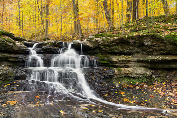 Fototapeta na wymiar Autumn Waterfall at Tailwater - Owen County, Indiana