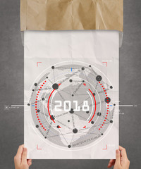 Naklejka premium hand showing 2018 and social media icon on crumpled paper as concept