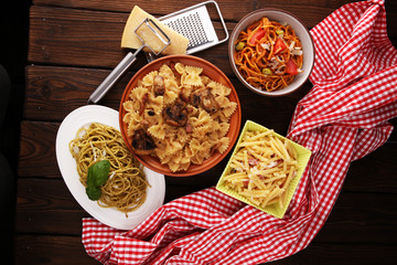 Italian pasta selection with pesto, carbonara, tomato spaghetti fresh vegetables cuisine