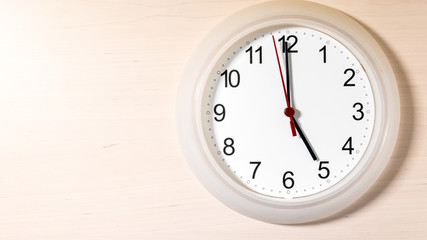 Clock ticking showing five hours