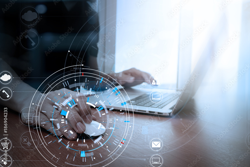 Poster businessman hand working with modern laptop computer in modern office with virtual icon diagram