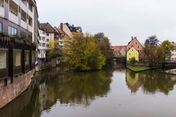 landscape from bridge over river Pegnitz in old town Nurnberg of living medieval houses, Bavaria, Germany