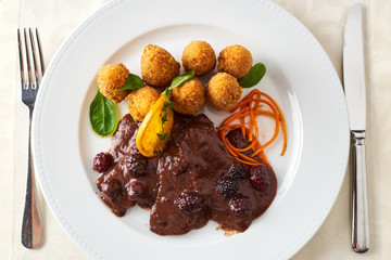 Roast boar with wine sauce and mulberry
