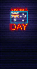 Australia day. Neon sign on brick wall. Australian National Holiday. Flag and text. Vertical banner template.