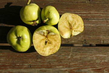 organic apples on wooden table