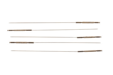 Silver needle acupuncture on an isolated white background. Close-up.