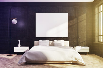 Black bedroom, white bed, poster toned