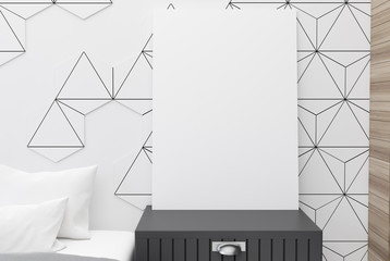 Poster on a bedside table, white