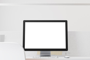 White computer screen in office
