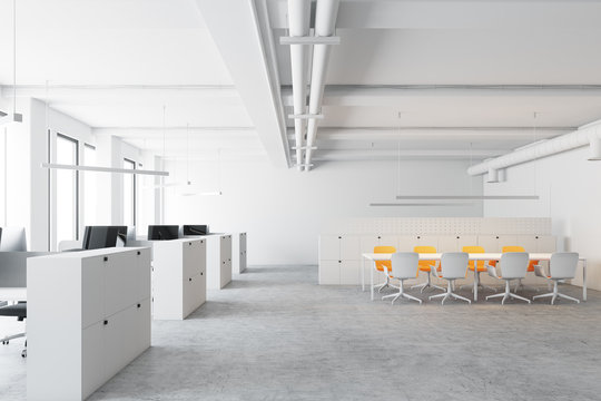 White meeting room, yellow chairs, office