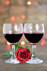Valentines Day rose and red wine. Love concept.