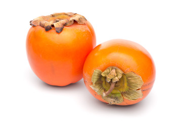 Persimmon fruits on white