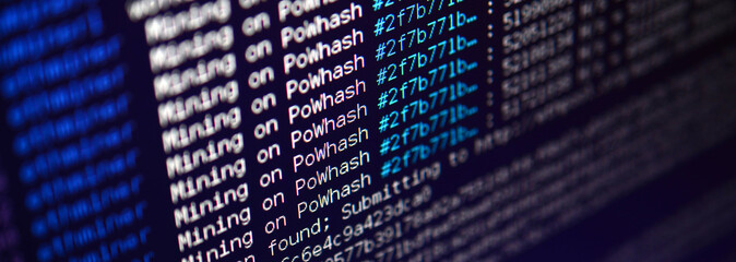 Macro snapshot of the program interface for crypto currency mining on the monitor of an office...