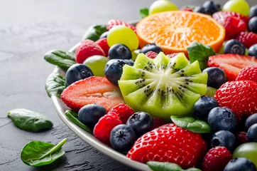 Fotobehang Fruit platter with various fresh strawberry, raspberry, blueberr © losinstantes