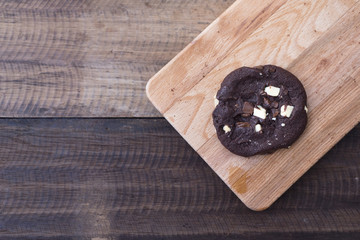 cookies on a wooden table.cookies stacked on a wooden board