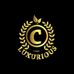 Naklejka premium C Luxurious Logo Gold Vector Template Design