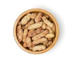 Raw peanut in wooden bowl isolated on white background