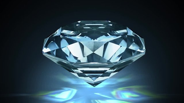 Close-up view on big rotating diamond. Looping animation.