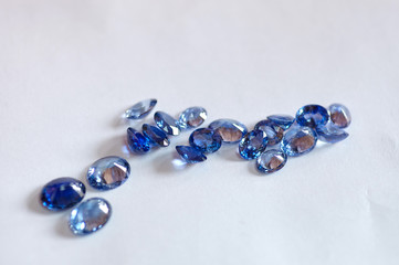 Natural mineral gem stones supphirus on the background