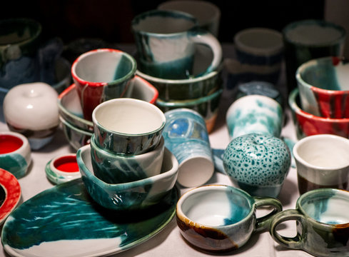 Colorful painted and glazed ceramic craft pottery ranges 
