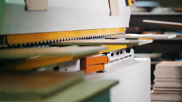 Treatment of wooden furniture parts on the factory