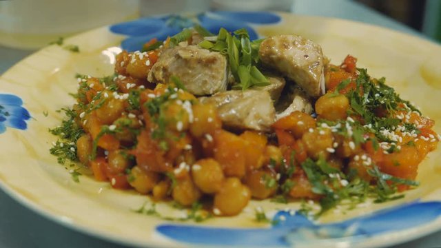 the cook prepares a delicious dish