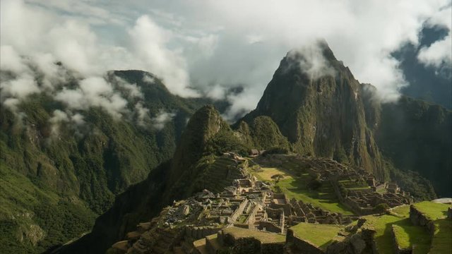 time lapse of peru's famous lost inca city of machu picchu on a misty morning