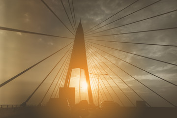 Silhouette Of Suspension bridge in Thailand,Traffic and Transportation concept