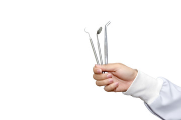 Hand holding of Dental tools and equipment isolated on white background with clipping path,dentist concept