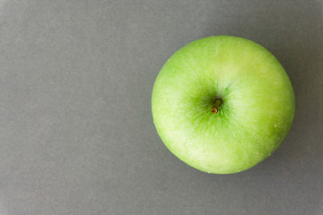 Closeup tov view green fresh apples fruit on grey background , healthy diet food concept