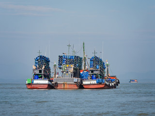 Naklejka premium Fishing boats in Myeik, Myanmar