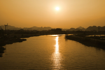 Fototapeta na wymiar Sunset on Tam Coc River, Vietnam