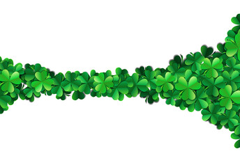 Saint Patricks day background with sprayed green clover leaves or shamrocks