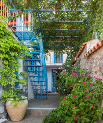 Greek Village Garden with blue stairs