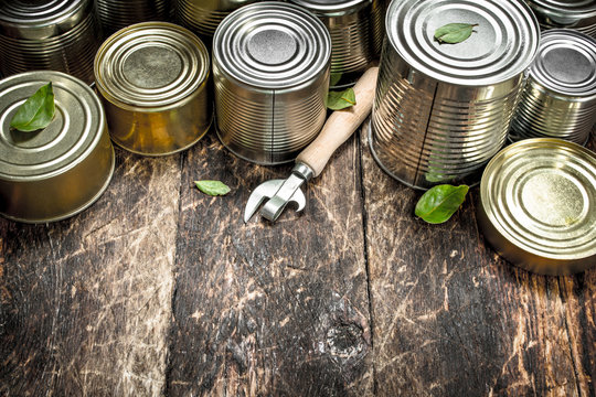Food in tin cans with opener.