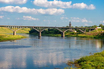 Fototapeta na wymiar The view at the bridge across the Volga river in the town of Staritsa, Russia
