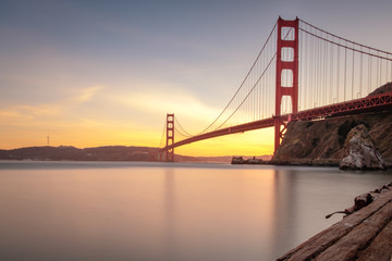 Sunset brings a warm glow to the Golden Gate Bridge