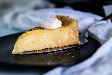 homemade lemon cake in a black plate