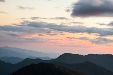 Fototapeta premium Long explosure shot, Beautiful sunset scene at Phu chi fah Chiangrai Thailand