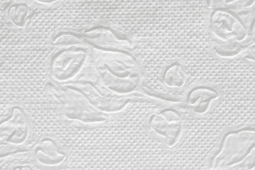 Napkin white with floral pattern. Background with paper texture.