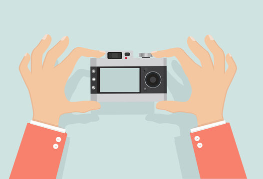 hands holding taking a picture with  Photo Camera Photography