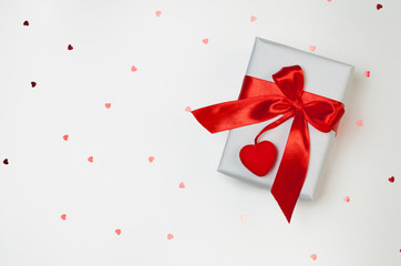 Gift box with hearts on white background. Top view, flat lay. St. Valentine's day greetind concept