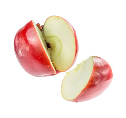 lovely ripe Apple cut into pieces. The separated sector falls out of the rest