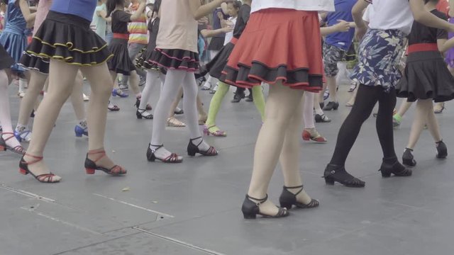 Chinese children dancing in park class