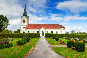 Fototapeta na wymiar Small church over the blue sky in Sweden