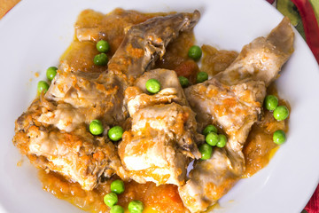 stew of rabbit with carrot and peas
