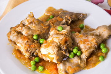 stew of rabbit with carrot and peas
